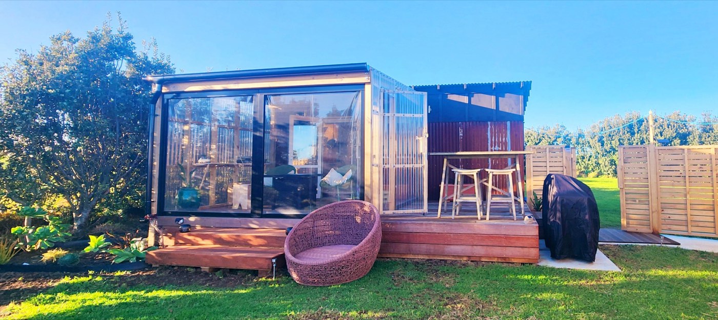 The cabin and its deck in the sun