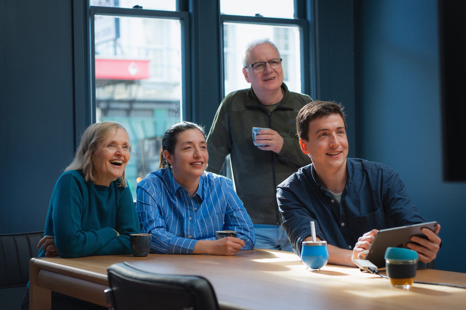 Xavier and clients around the table at the XAVER office