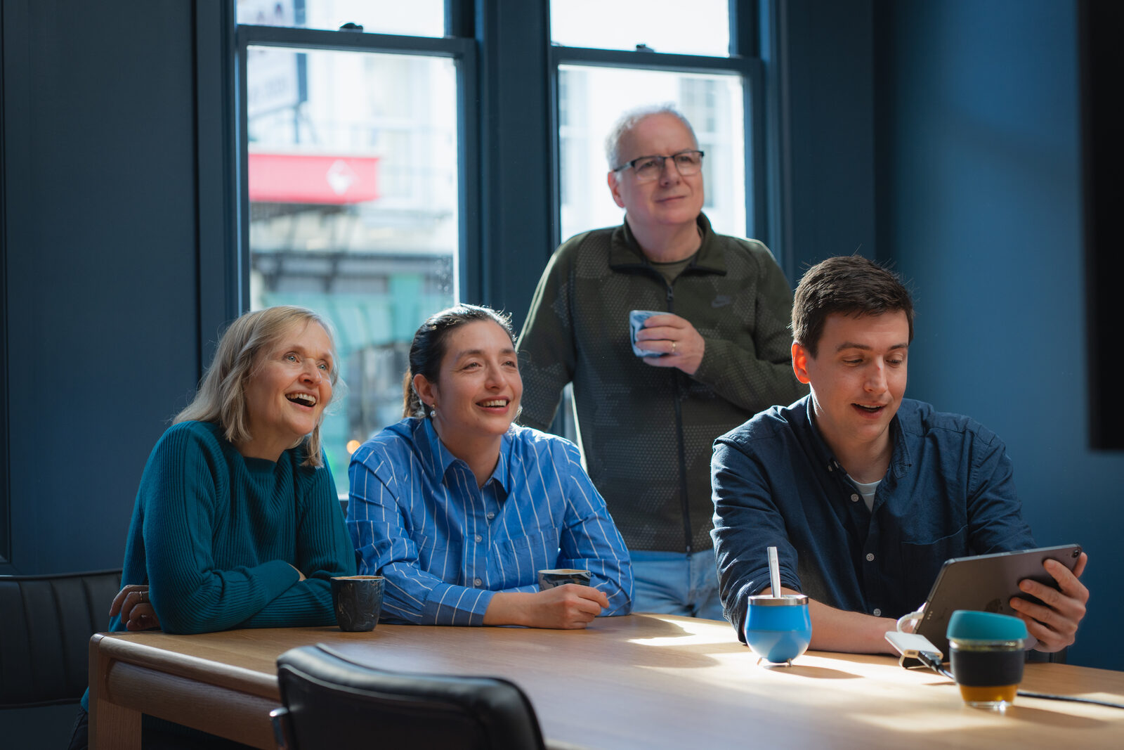 Xavier and clients around the table at the XAVER office